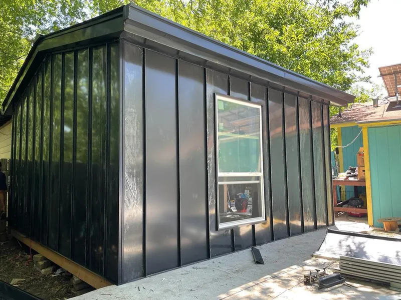 Black standing seam metal wall panels for Metal Roof Installation in Sunbury